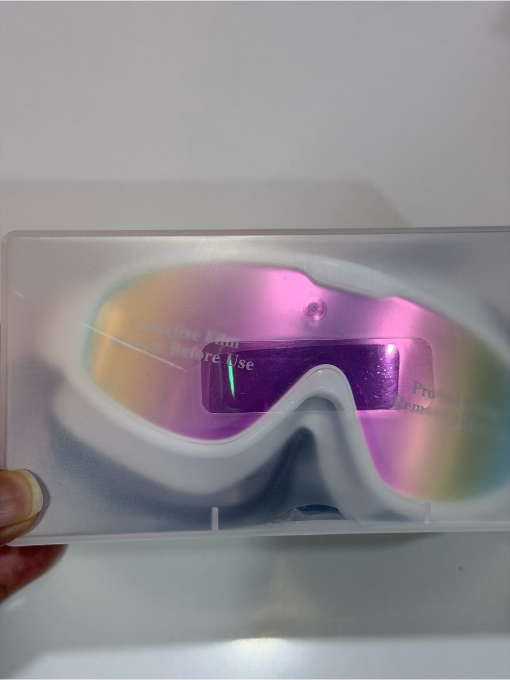 Wide-view anti-fog swimming goggles with large frames and mirrored lenses.